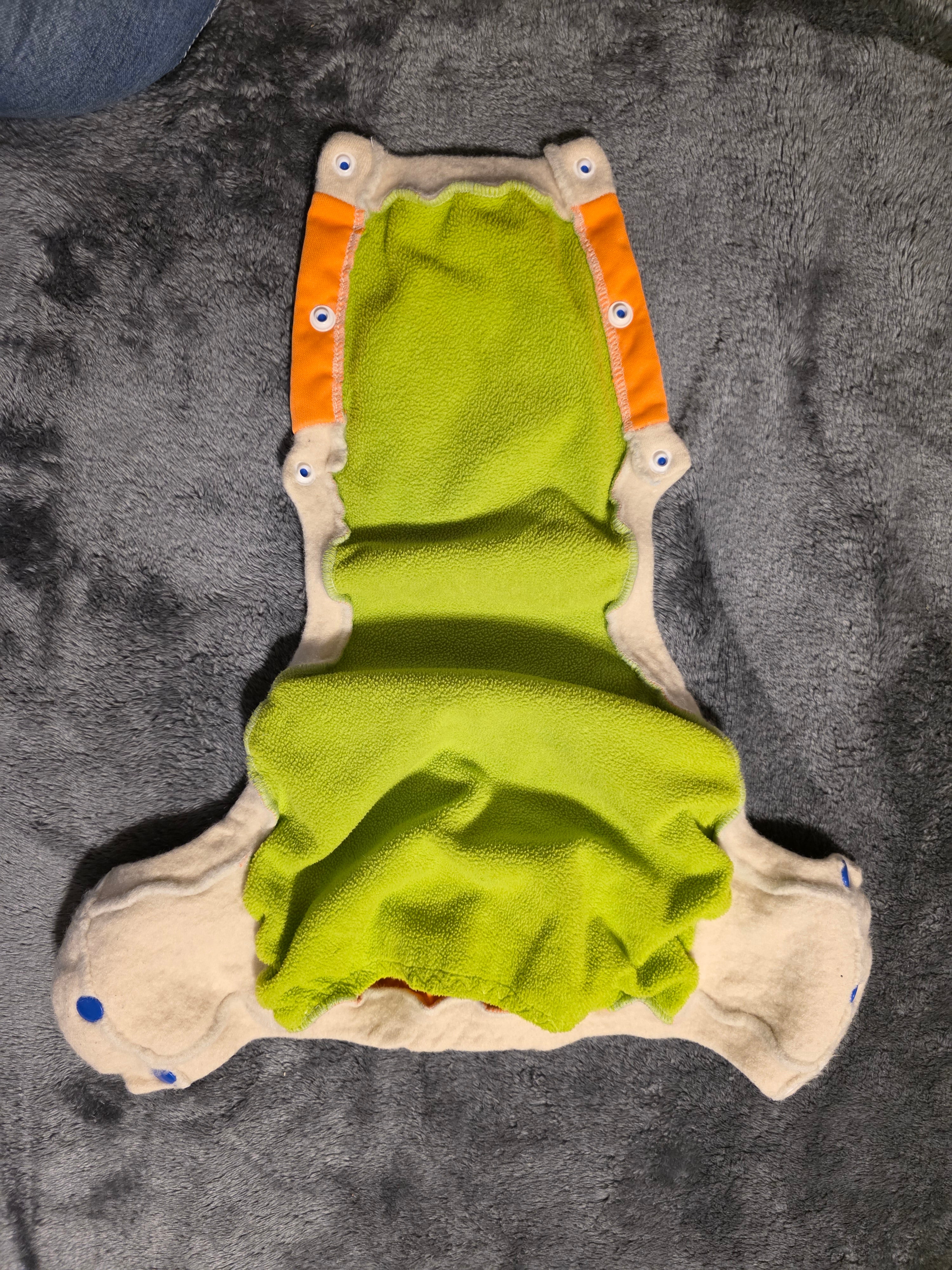Wool? Edging. Trainer. Says 3t but is small. Never worn. Friend gifted.