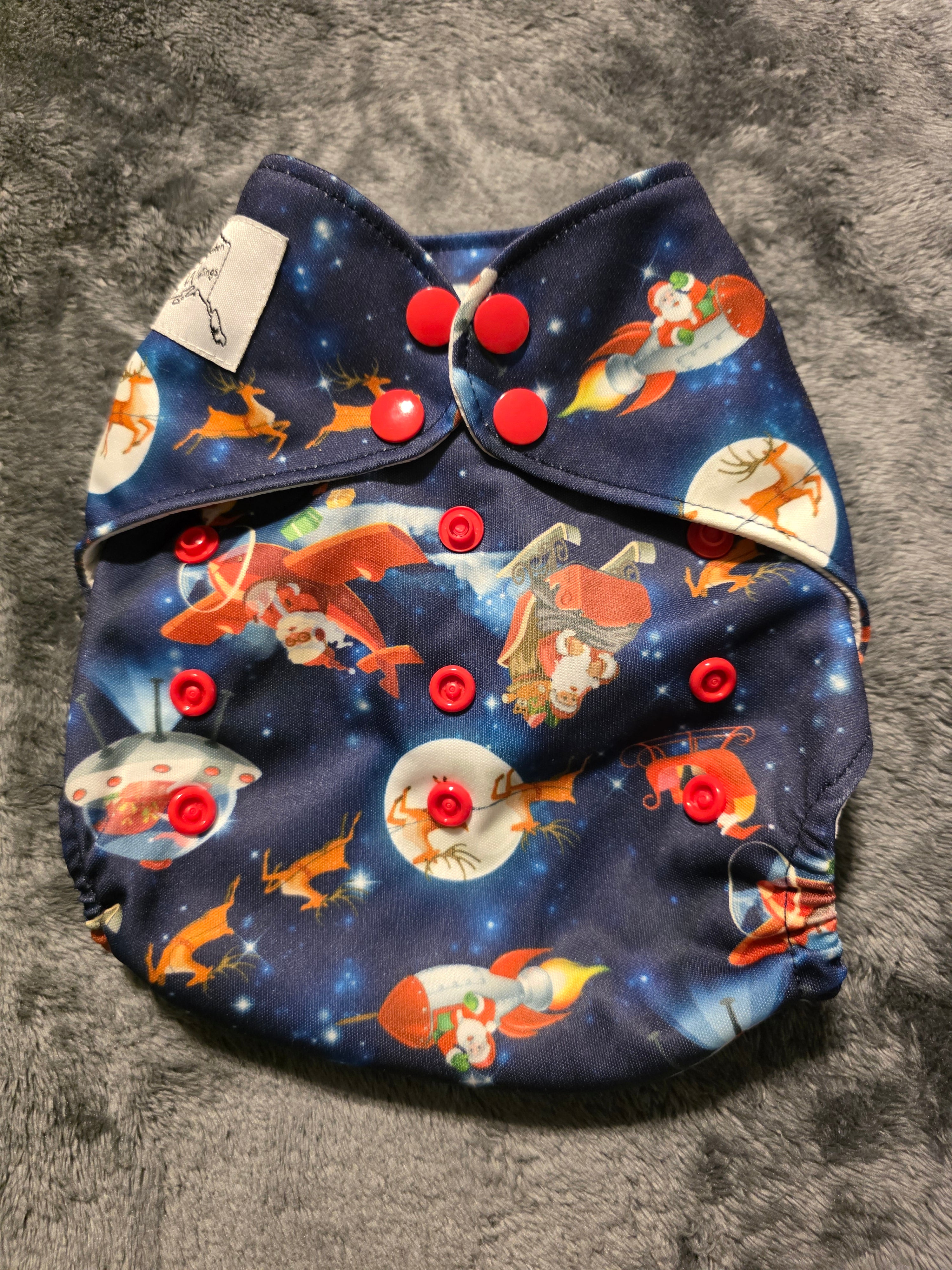 OS Alaskan Wildings pocket (Santa's rides)
